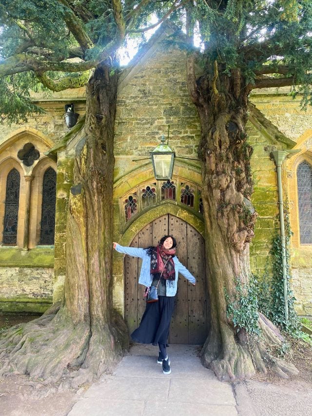Abi-standing-by-Doors-of-Durin-at-St-Edwards-Church-Stow-in-the-Wold.