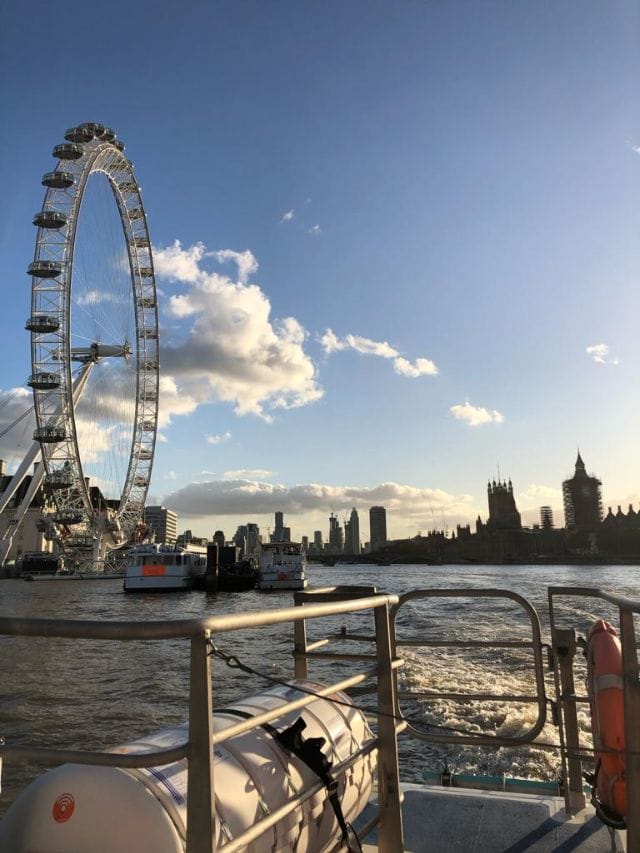 Views of the London Eye from the boat on the River Thames.